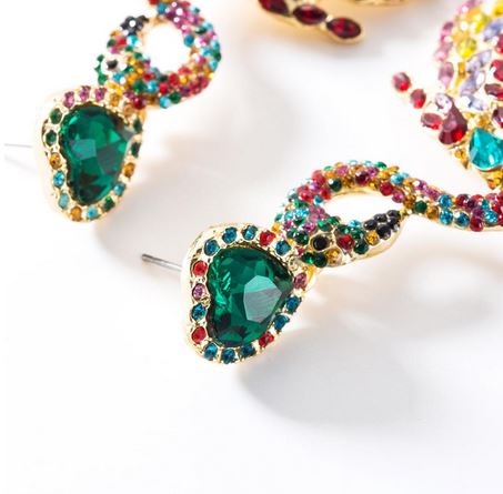 magnifique boucles d'oreilles flamant rose