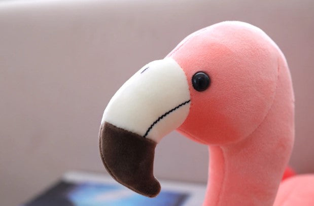 tete de flamant rose en peluche pale
