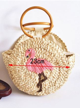 petit sac en paille boule flamant rose
