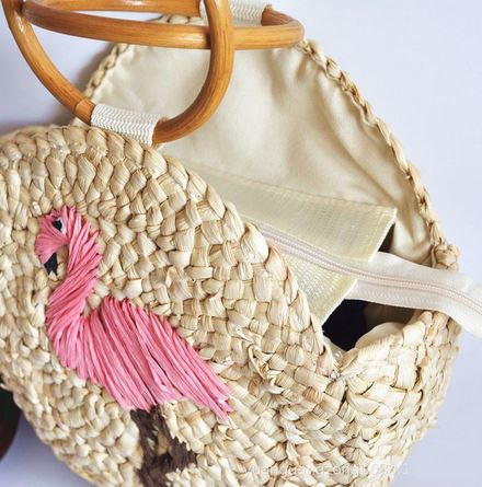 sac boule en paille et rotin flamant rose