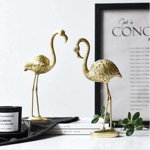 statues flamant rose dore