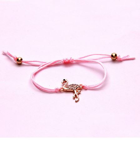 bracelet rose avec flamant rose et perle or